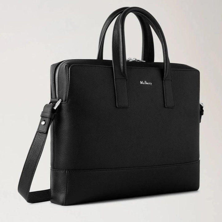 Mulberry Farringdon Briefcase Pebble Grain shows an elegant black leather briefcase with shoulder strap, model HB5128645A100.