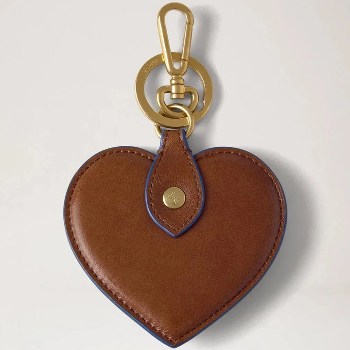 Mulberry Heart Keyring Oak Pigment Blue, heart-shaped key ring in brown leather with golden buckle. Model rk6003562g231.