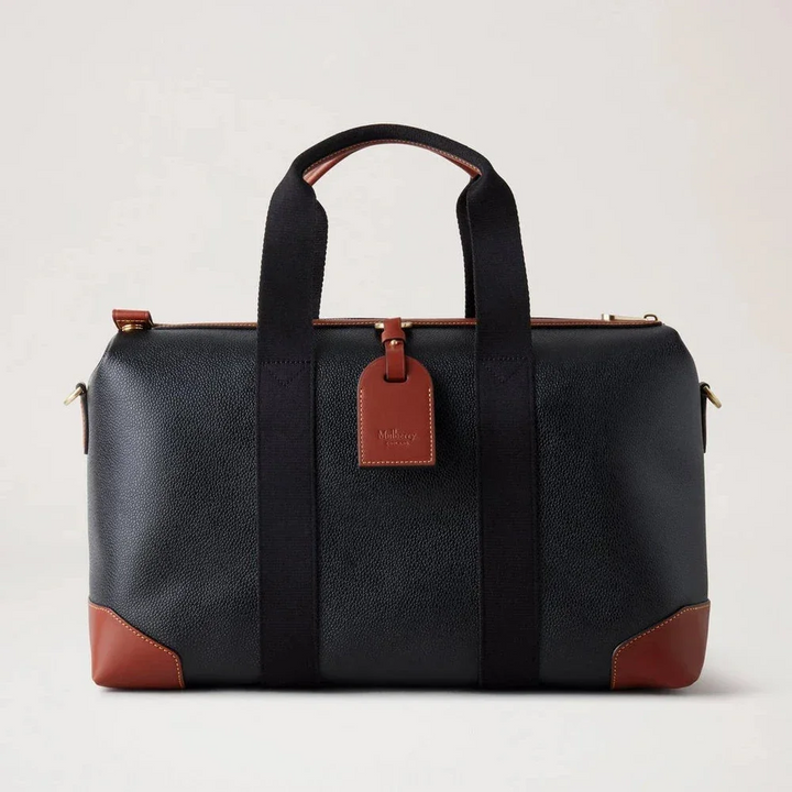 Mulberry Heritage Day Clipper Black and Cognac Printed Bioveg Scotchgrain travel bag in black and cognac with handle, model HS5195127A340.