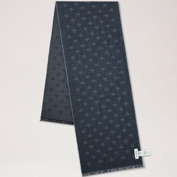 Mulberry While Scarf Tree Jacquard Charcoal shows a flat jacquard woven scarf in dark gray with a discreet pattern. Model VS4784950C110.