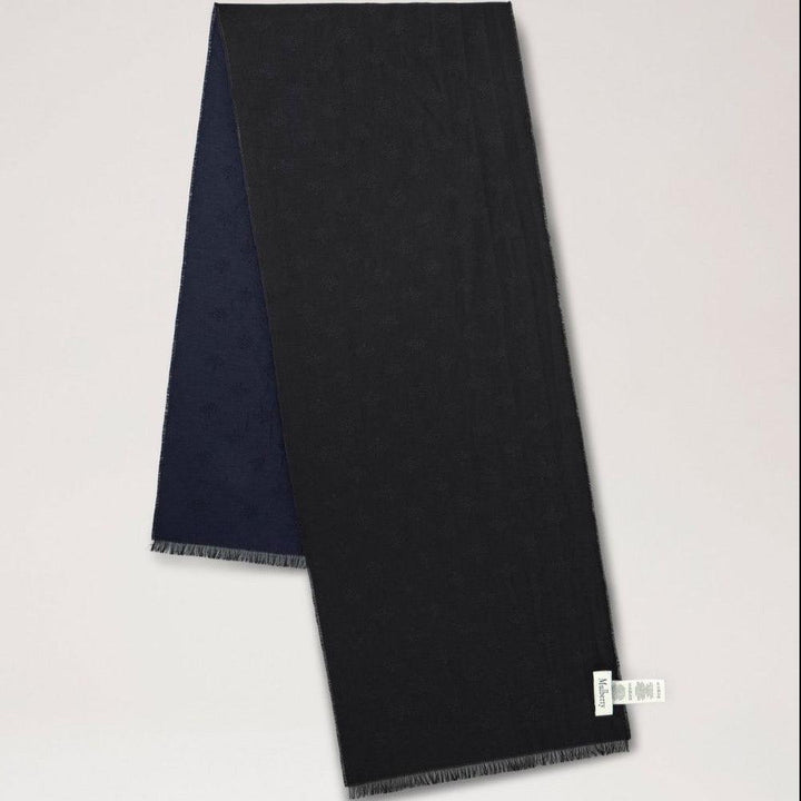 Mulberry While Scarf Tree Jacquard Midnight shows an elegant dark blue scarf in soft material with discreet fringes, Model VS4784950U135.