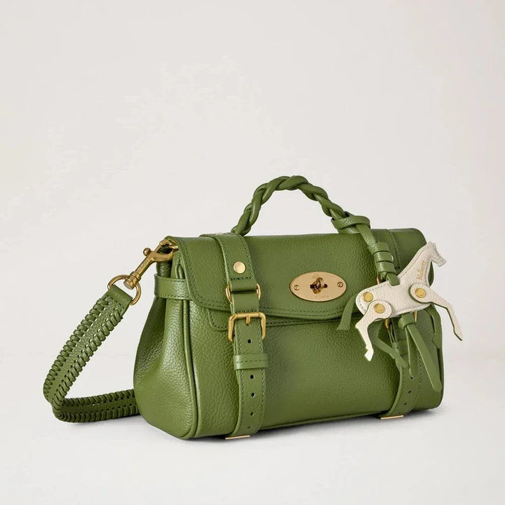 Mulberry Mini Alexa Chalk Horse Fern and Chalk Small Classic Grain shows a small green leather bag with braided handle and white horse pendant. Model RL9021205Q760