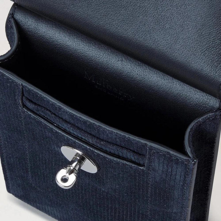 Mulberry Mini Antony Pouch Corduroy Suede Night Sky shown close up, open front in dark blue velvet with silver detailing.