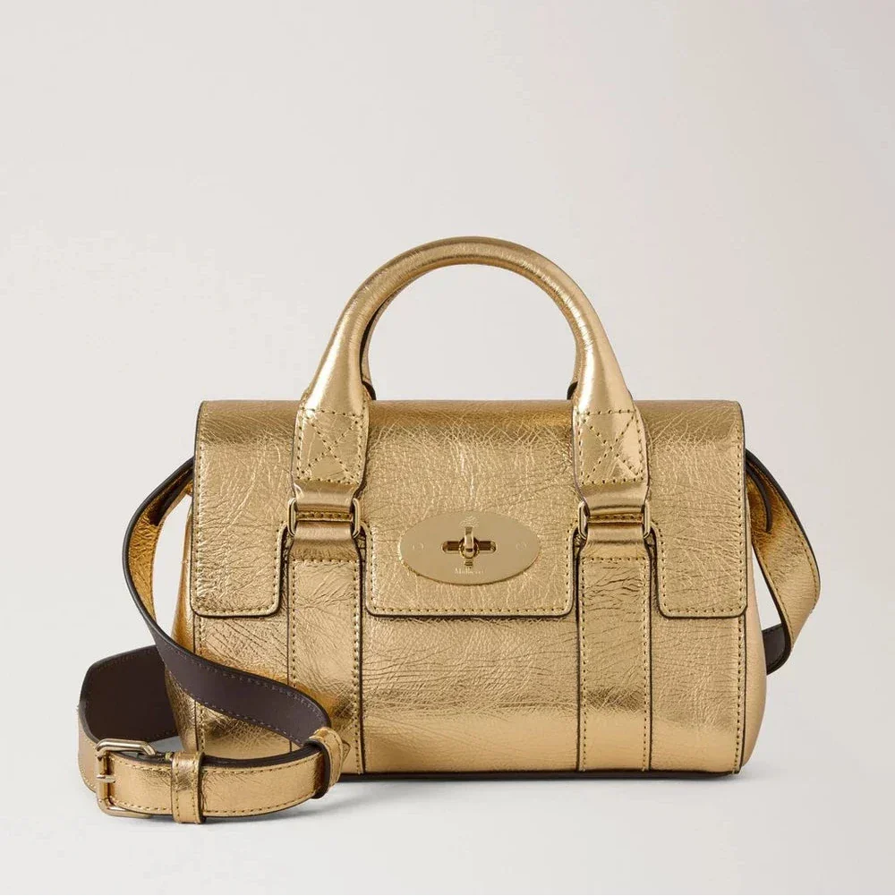 Mulberry Mini Heritage Bayswater Metallic Somerset Gold shows a Small Shoulder Strap Handbag in Shiny Gold, Model RL8918757Z098.