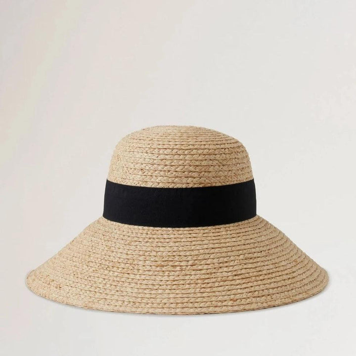 Mulberry Raffia Sun Hat Wide Brim with black band, natural colored straw hat on a light background. Model vh4136060h120-001-2