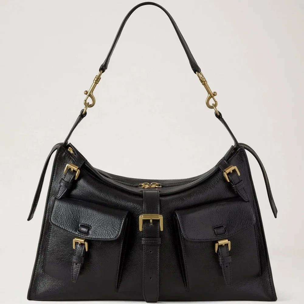 Mulberry Roxanne Shoulder Bag, high shine black leather with brass details, front view. Model hh9886213a100