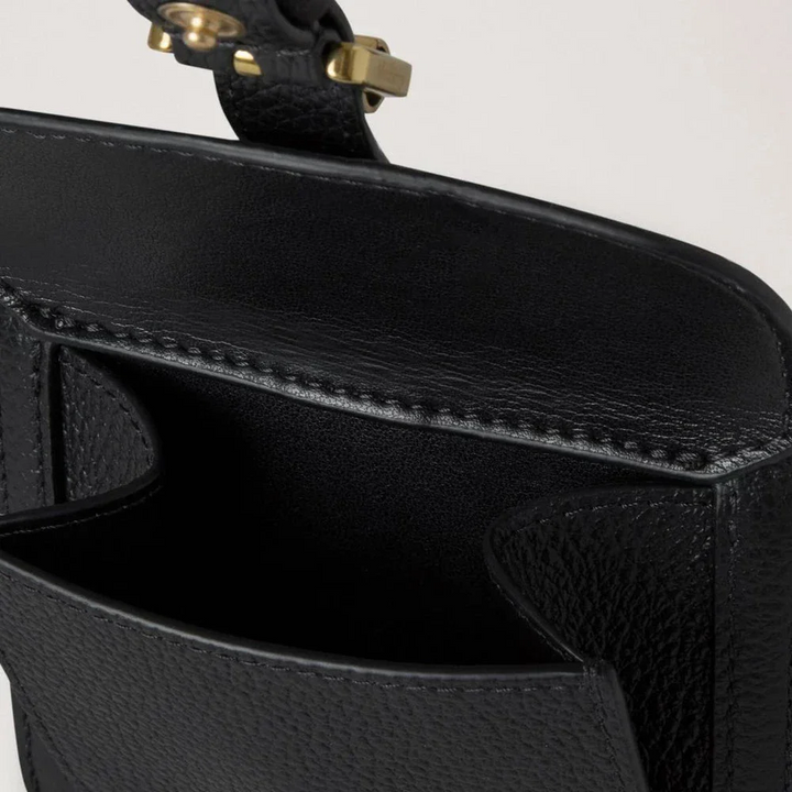 Mulberry Roxanne Wallet Black Small Classic Grain, detail of black wallet in embossed leather with golden buckle.