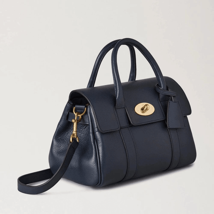 Mulberry Small Bayswater Satchel Night Sky shows a small, dark blue leather bag with gold metal details. Model HH9216205U888.