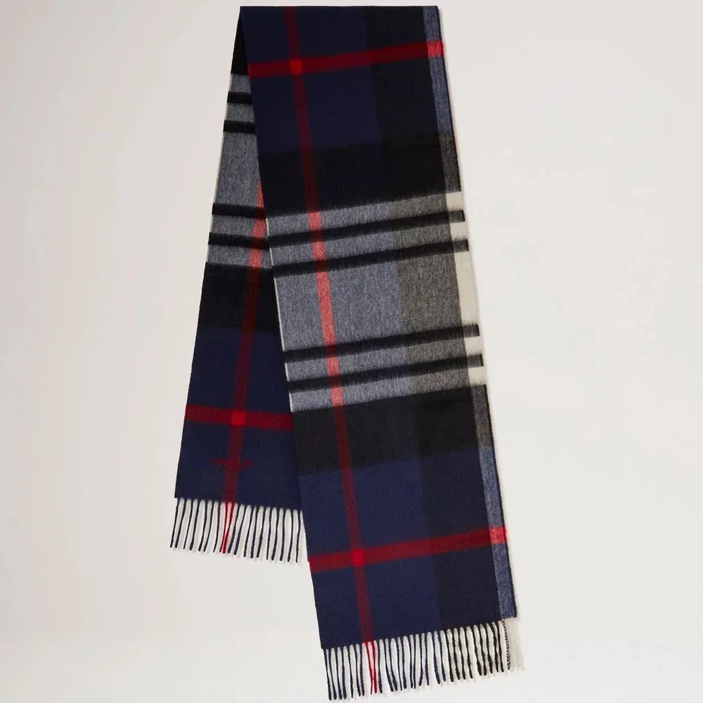 Mulberry Small Check Merino Wool Scarf shows a classic scarf in blue, gray and red with fringes. Model VS4319890U897
