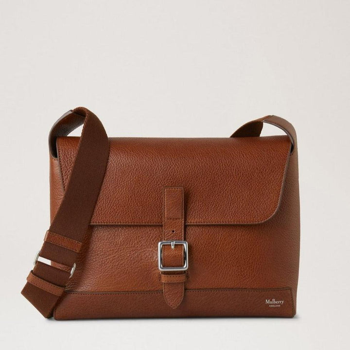 Mulberry Small Chiltern Crossbody Messenger Legacy NVT shows a brown leather crossbody bag with an adjustable strap and buckle at the front. Model HH9375275G110.