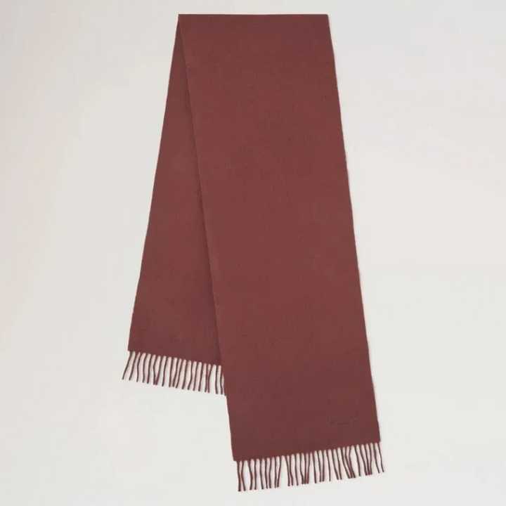 Mulberry Small Solid Merino Wool Scarf shows a solid brown wool scarf with fringes. Model VS4318946G222