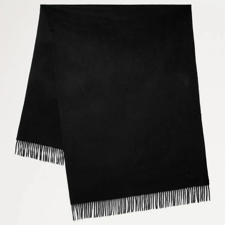 Mulberry Solid Merino Whool Scarf Black shows a black merino wool scarf with fine fringes. Model VS4240947A100.