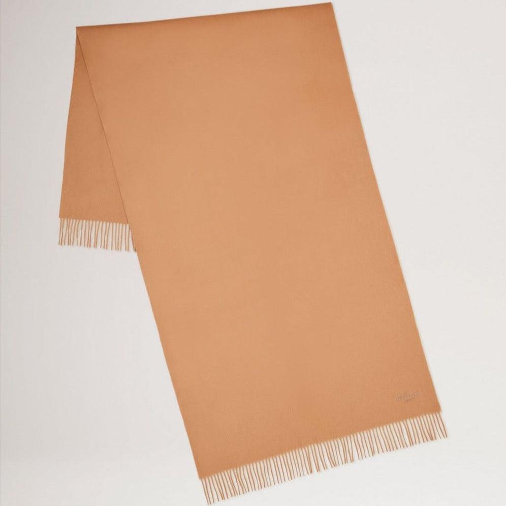 Mulberry Solid Merino Wool Scarf in camel merino wool with fringes, seen flat against a white background. Model vs4240947h150