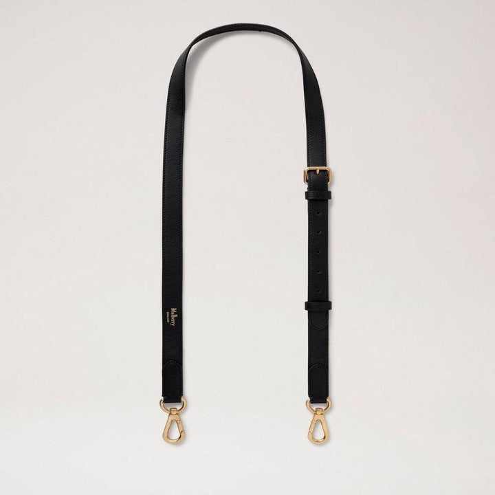 Mulberry Thin Leather Strap Black features a black, adjustable leather strap with gold-tone metal buckles. Model RX0285587A100.