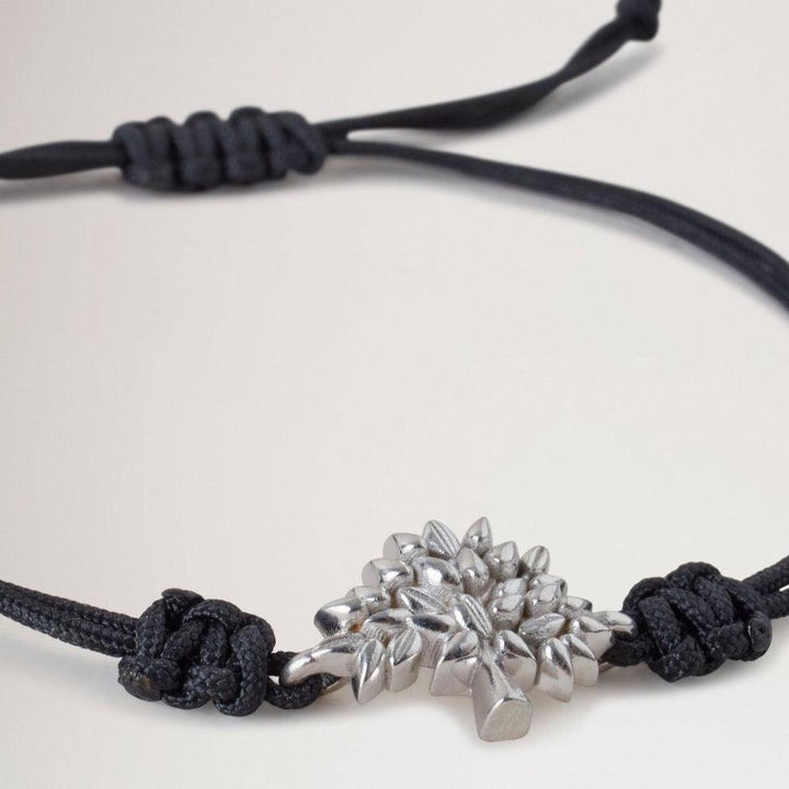 Mulberry Tree Cord Bracelet Black Sterling and Silver shows black adjustable cord with silver tree pendant. Model qb2392000a100