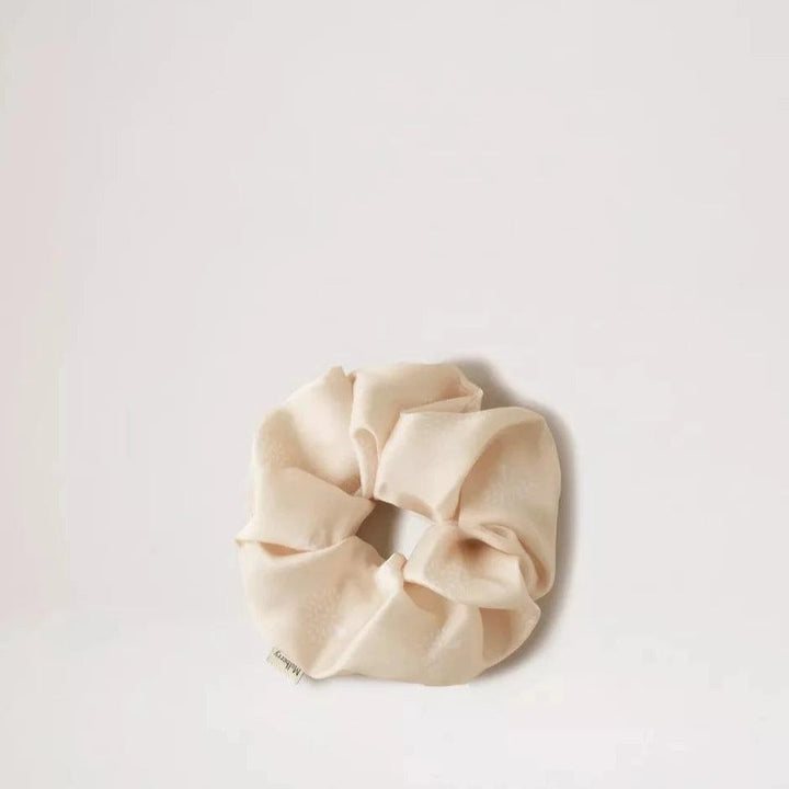 Mulberry Tree Hair Scrunchie Cream in light beige satin look, simple and elegant on a neutral background. Model VA0009948H130