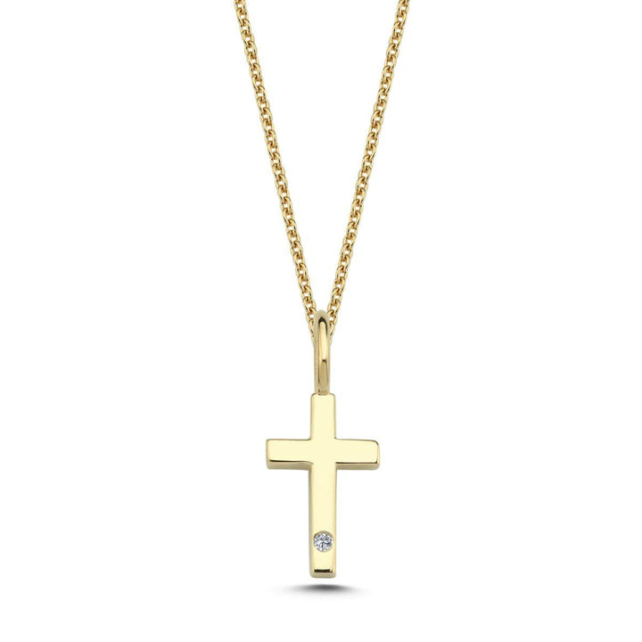 Nuran 14kt Gold Cross with 0.005ct W/SI shows a single cross pendant in bright gold with a small diamond. Model v2250-kors0005rg-1.