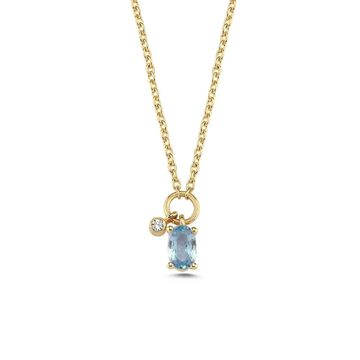 nuran-gaia-14kt-necklace-bla-sapphire-and-0-01ct-w-si-v2570sa-001rg. Elegant necklace in yellow gold with blue sapphire and small clear stone. Model v2570sa-001rg