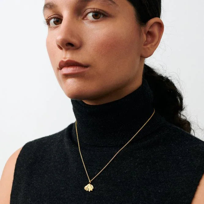Pernille Corydon Autumn Leaf necklace in gold plated silver shown worn by model, Model N-497-GP-1