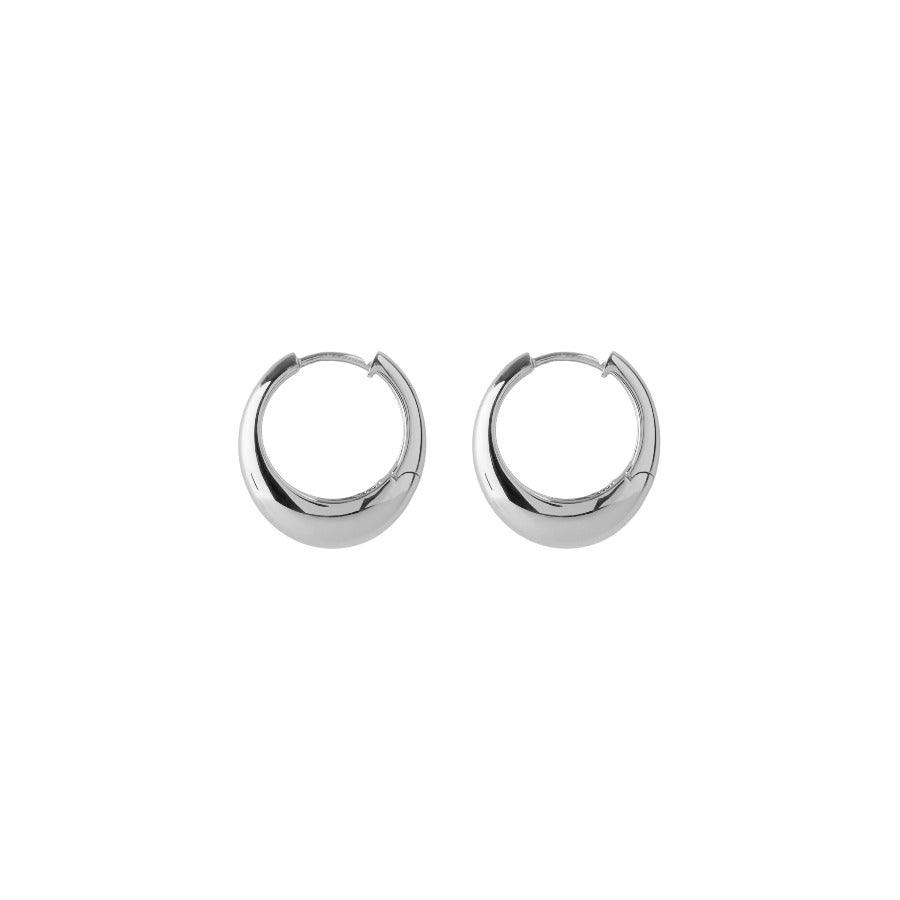 Pernille Corydon Globe Huggies in silver, stylish and shiny creoles on a white background. Model E-401-S.