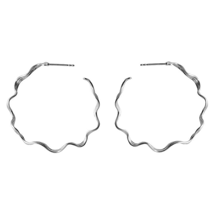 Pernille Corydon Large Hellir Silver Hoops, wavy hoops in bright silver, displayed against a white background. Model E-464-S