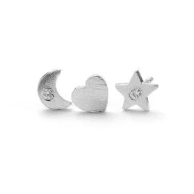 Pernille Corydon Night Light Earsticks shows three silver earrings in the shape of a moon, heart and star. Model C-122-S