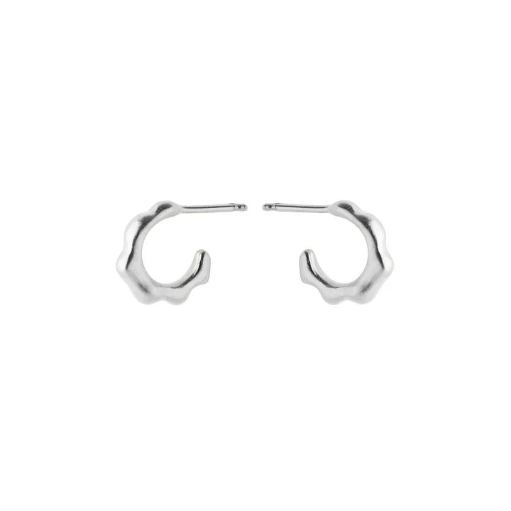 Pernille Corydon Small Aqua Hoops silver earrings with a wavy surface in a minimalist design. Model E-148-S-1.