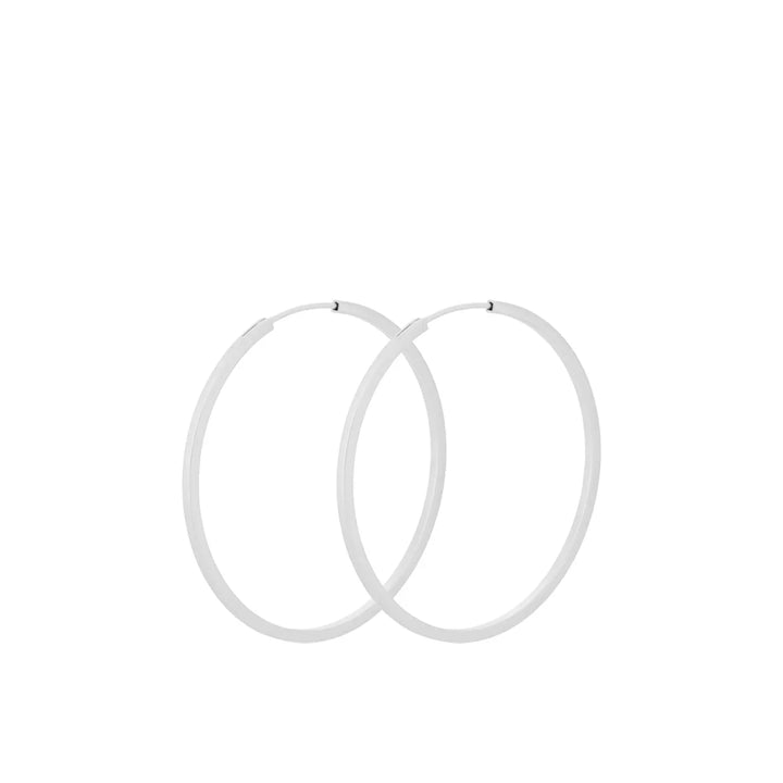 Pernille Corydon Small Orbit Hoops in silver, two simple hoops in minimalist style. Model E-052-S-1.