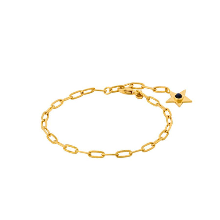 Pernille Corydon Twinkling Star bracelet in gold-plated silver with star pendant and black stone, Model B-382-GP-1