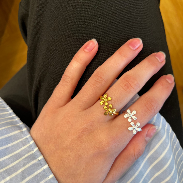 Pernille Corydon Wild Poppy gold plated ring worn on finger, floral detail, Model R-364-GP-001