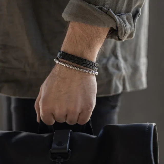 Son of Noa men's bracelet in black leather on wrist, braided design, Model 809702691-001-2