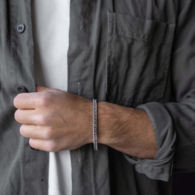 Son of Noa men's bracelet in steel is shown on a man's hand, discreet and stylish design. Model 80930082721