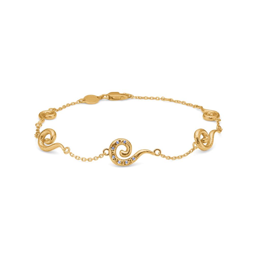 Studio Z Curiosity gold-plated bracelet with blue zirconia in an elegant twisted design on a white background. Model 7257871-1