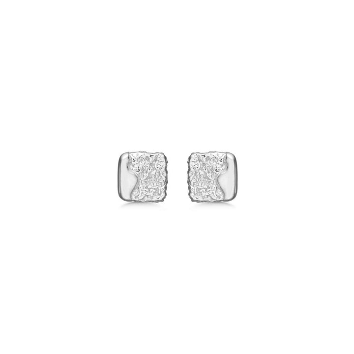 Studio Z Edge silver studs with square, raw texture, glossy surface. Model 7110890-1