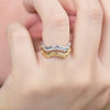 studio-z-rime-solv-ring shows two rings in silver and gold with wavy pattern on finger. Model 7140948-001