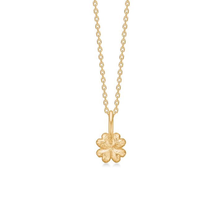 Studio Z Serene Clover necklace in gold-plated with four-leaf clover pendant against a black background. Model 7220359