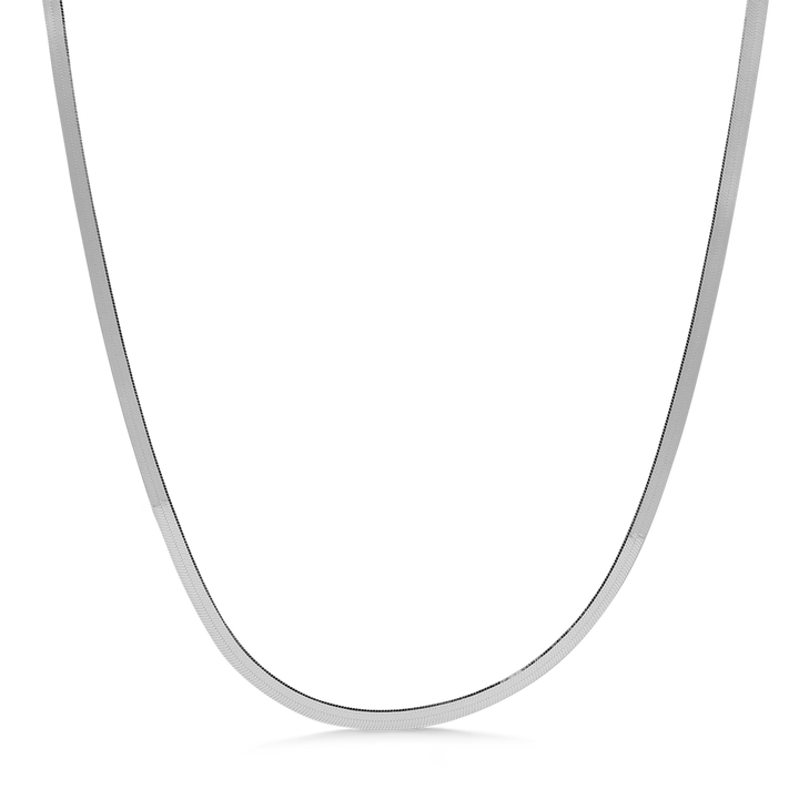 studio-z-small-cobra-necklace-in-sol shows an elegant, smooth silver necklace against a black background. Model 7120319