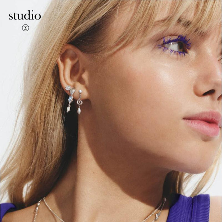 studio-z-solv-curiosity ear pendant shown on model with pearls and silver details, Model7113870-2