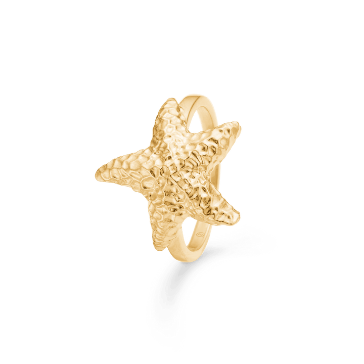 Studio Z Starfish Luster gold-plated ring with clear starfish in hammered gold finish, Model 7240903-001.