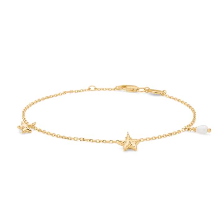Studio Z Starfish Luster gold-plated starfish bracelet with two starfish and a white pearl on a thin chain. Model 7253903-1