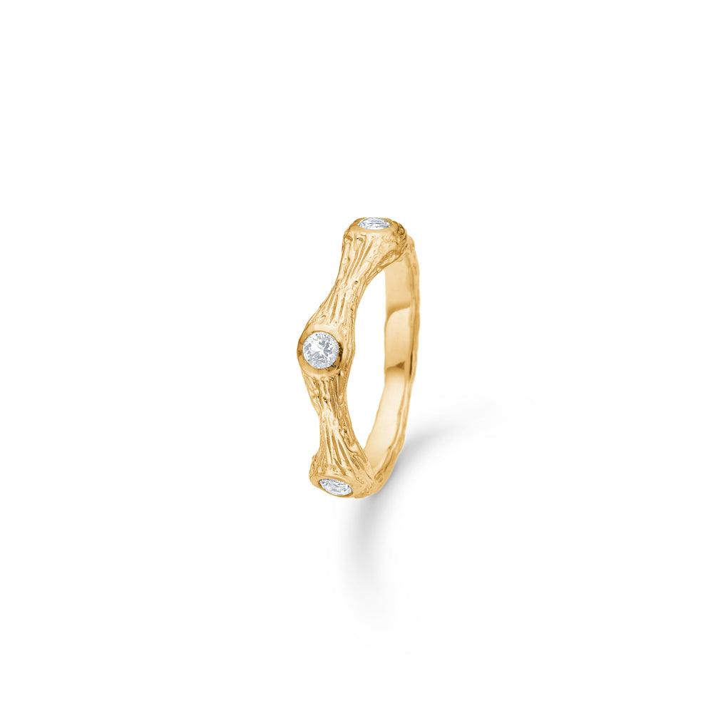Studio Z Tangled Ring showcases an elegant gold ring with a textured surface and set diamonds. Model 7247814-7247814-001-1