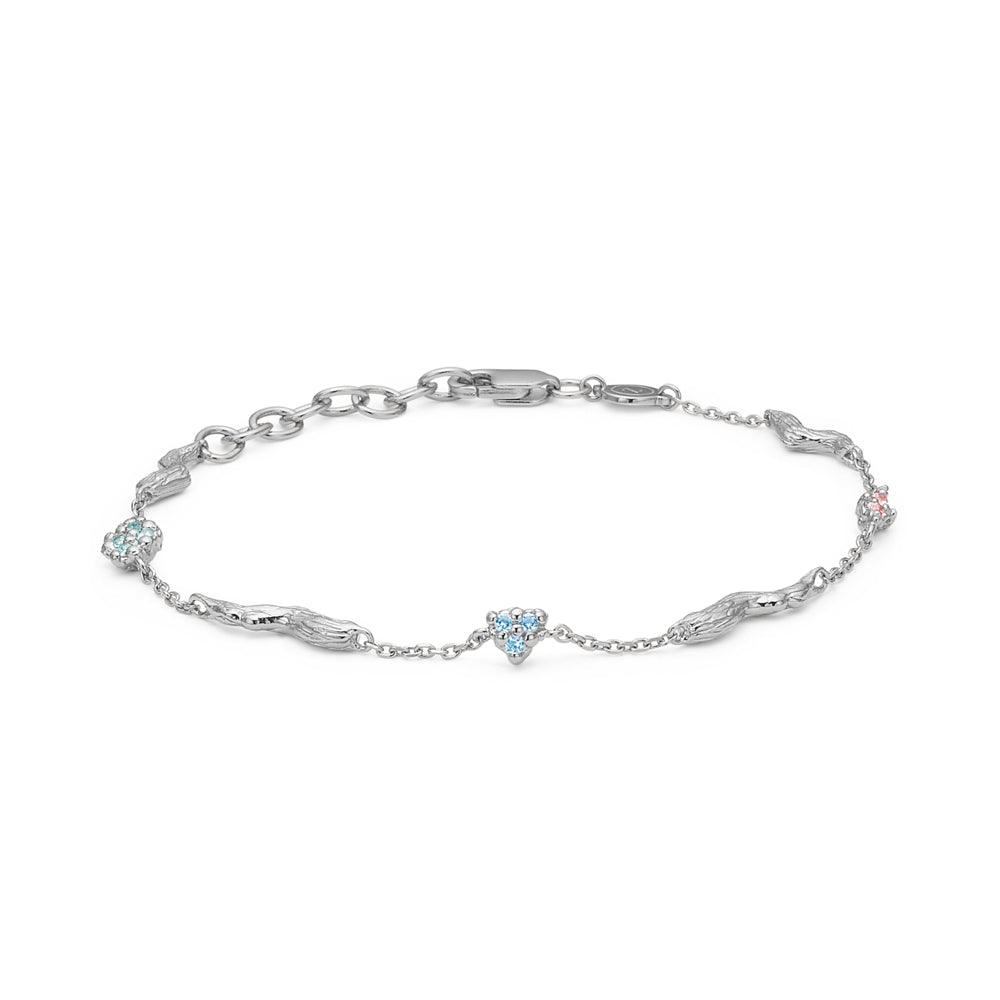 studio-z-tangled-solv-bracelet-m-blue-and-pink-zirkonia shows a slim silver bracelet with blue and pink zirconia. Model 7157847-1