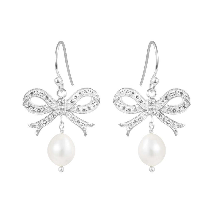 Susanne Friis Bjørner silver earrings with bow and white pearl, front view. Model 5067-1-900-1.