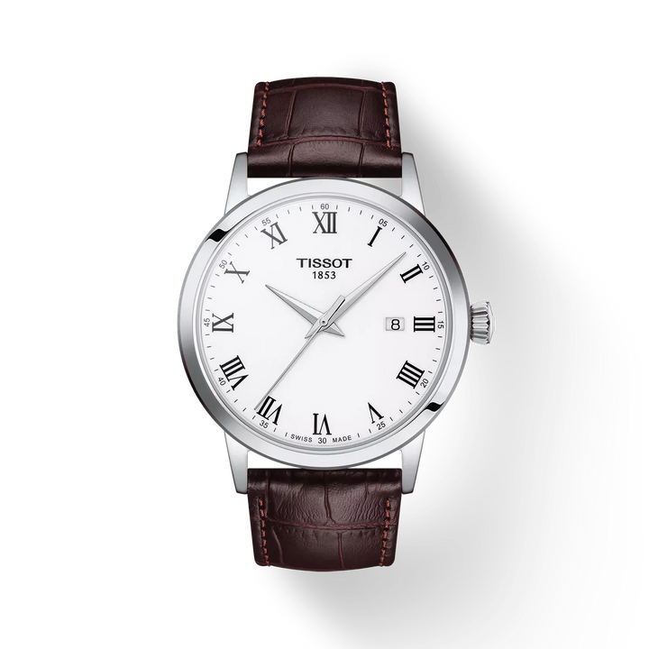 Tissot Classic Dream 42mm with white dial, Roman numerals and brown leather strap. Model T1294101601300.