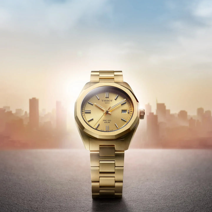 Tissot PRC 100 Solar 34mm gold PVD watch with solar plated dial and steel chain, Model T1518223302100
