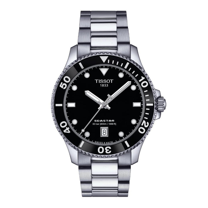 Tissot Seastar 1000 40mm shows a silver wristwatch with black dial and distinct white markings, Model T1204101105100.