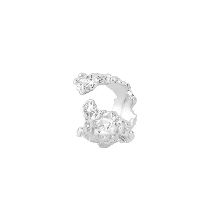 Vincent Archaic Shadow Solv Ring shows a wide, open silver ring with organic, raw surface texture. Model vj105-watch-001