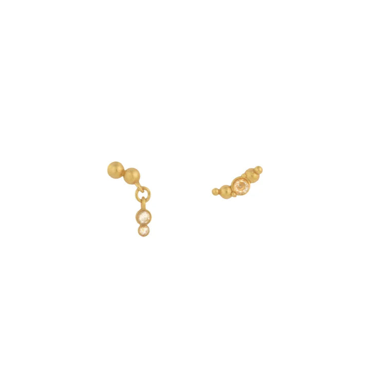 Vincent Pendulum Earrings Gold Plated shows two asymmetrical gold colored studs with matte surfaces. Model VJ177-UEG-1