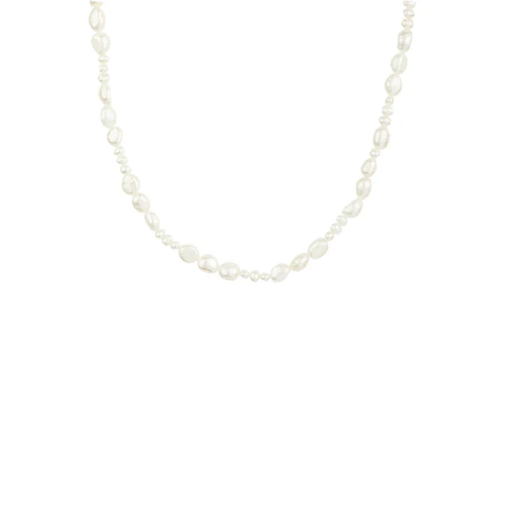 Vincent Venus Conspiracy Gold Plated Pearl Necklace, white irregular pearl necklace on light background. Model vj087.
