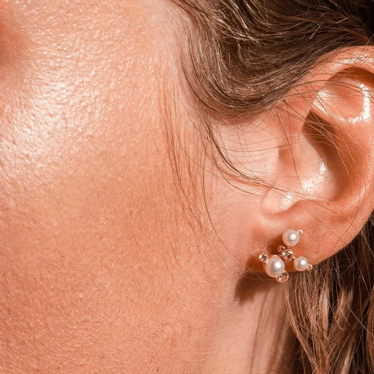 Vincent Venus Trinity Earrings Gold plated w. Freshwater pearls shown on ear, elegant pearls and stones, Model VJ211-UEG-1